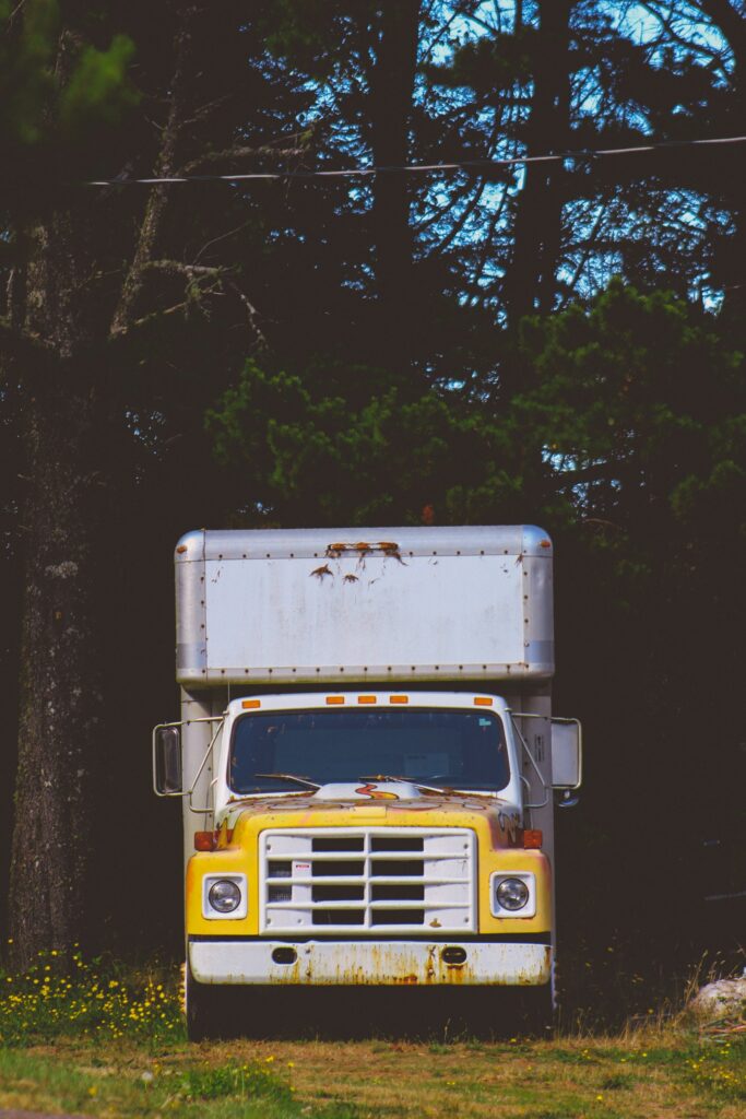 White and yellow box truck bobtail - Bobtail factoring review